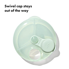 OXO Tot Formula Dispenser easy one-handed pouring in use.