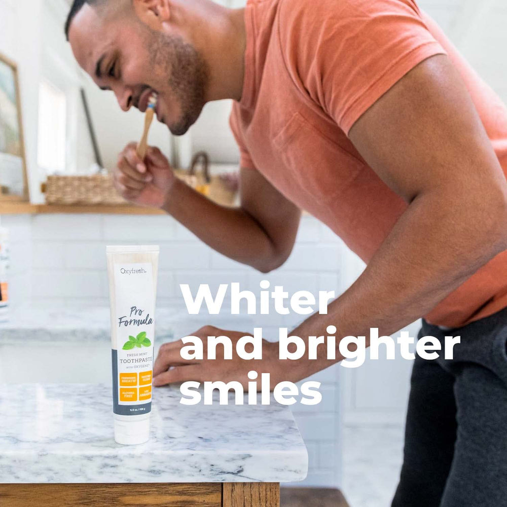Dye-free formula tag beside Oxyfresh Pro Formula Fresh Mint toothpaste