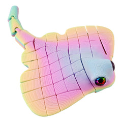 oyeftp Manta Ray fidget toy in multicolor gliding for stress relief.