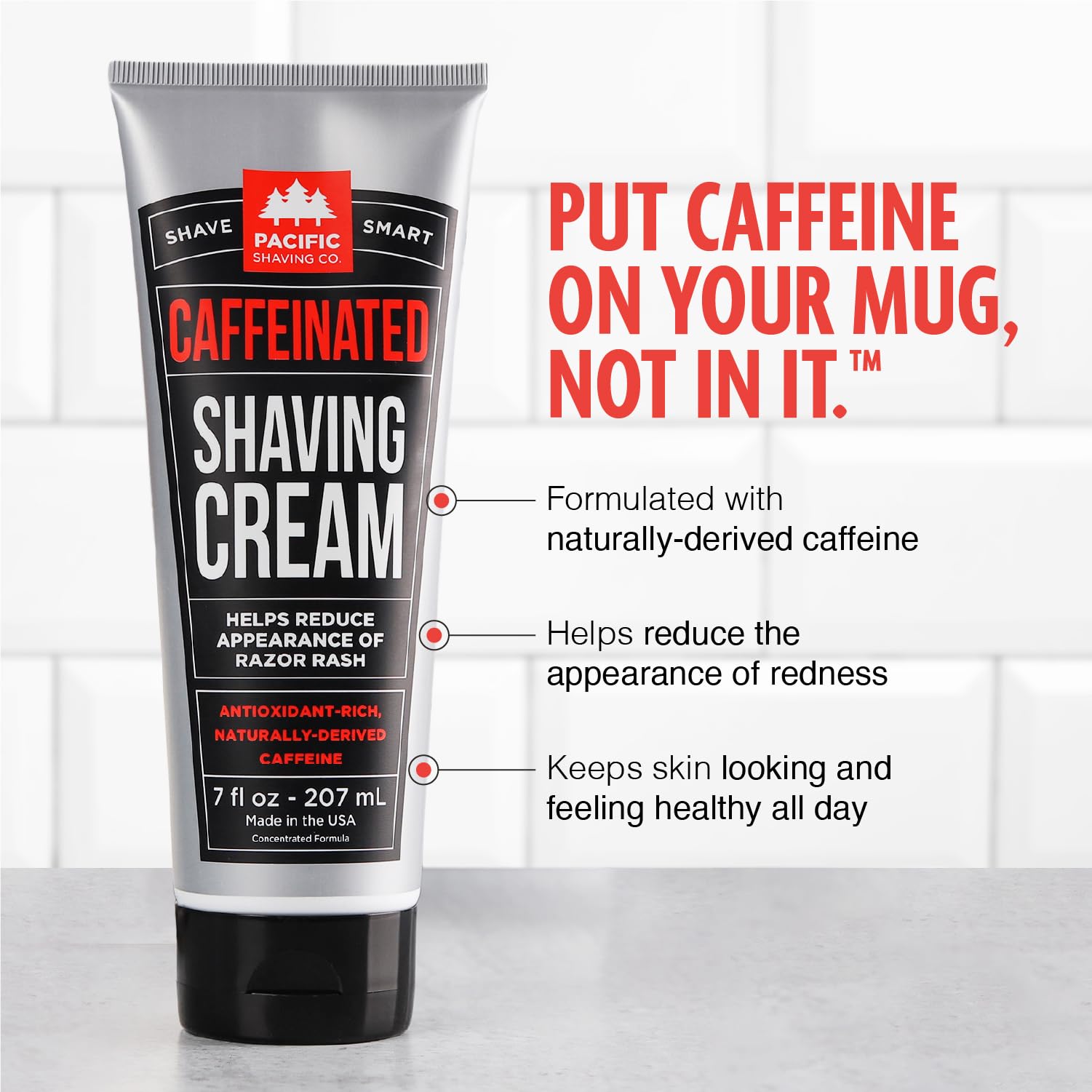 Pacific Shaving Company caffeinated shaving cream jar side view in packaging.