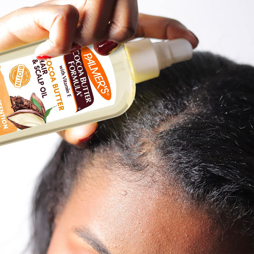 Palmer's Length Oil being applied as part of daily routine