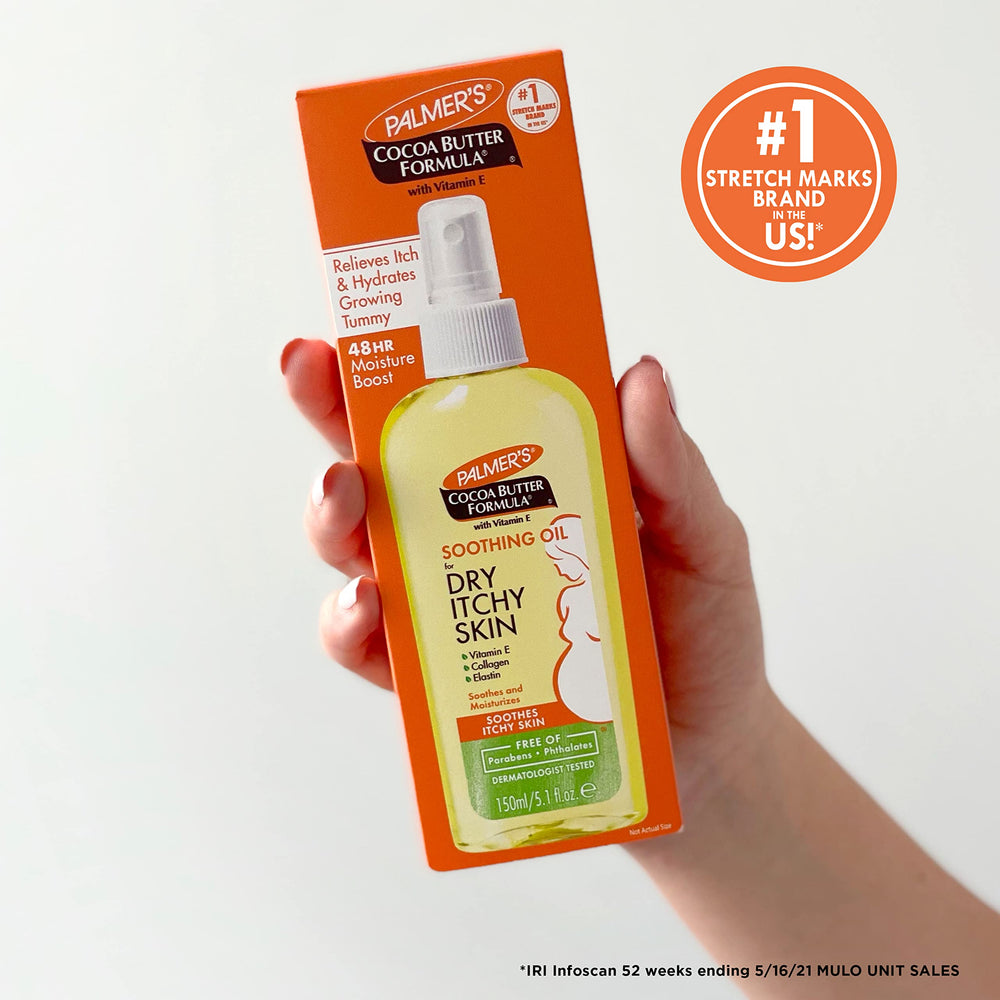 Product label close-up on Palmer’s Cocoa Butter Soothing Oil