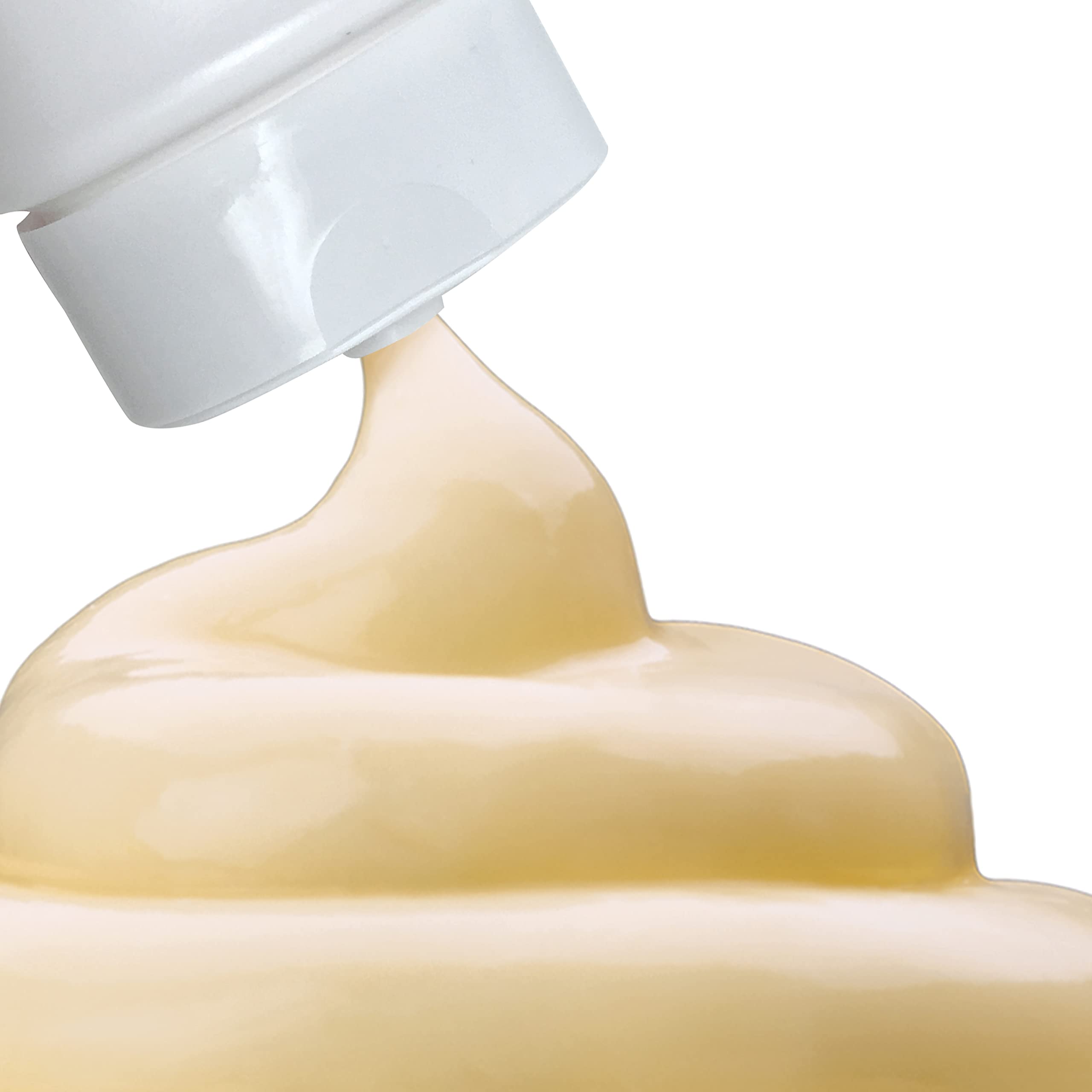 Large family-size Palmer's lotion bottle on bathroom shelf.