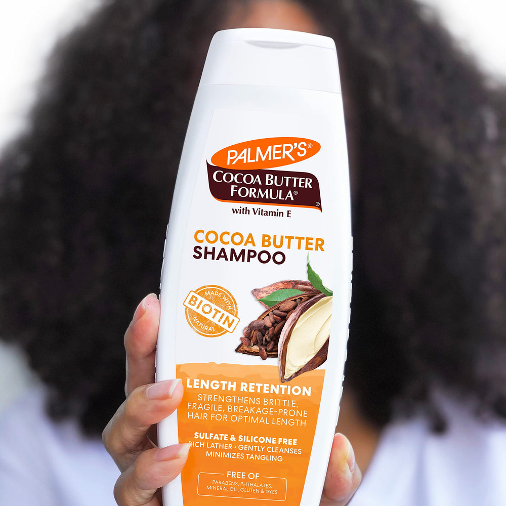 Palmer's Length Retention shampoo bottle shows color-safe formula.