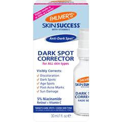 Palmer's Skin Success Dark Spot Corrector bottle on a vanity, focused on targeted fade of discoloration