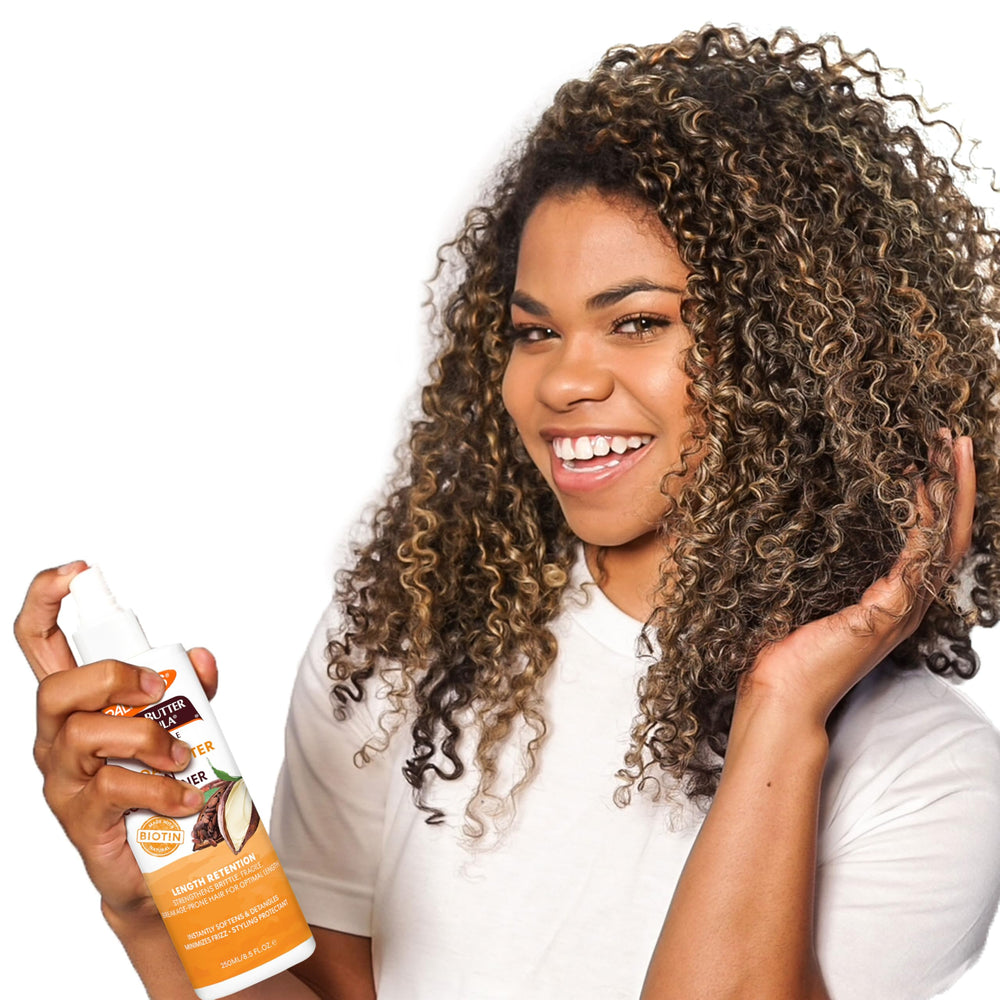 Silky, shiny curls after Palmer's leave-in conditioner use.