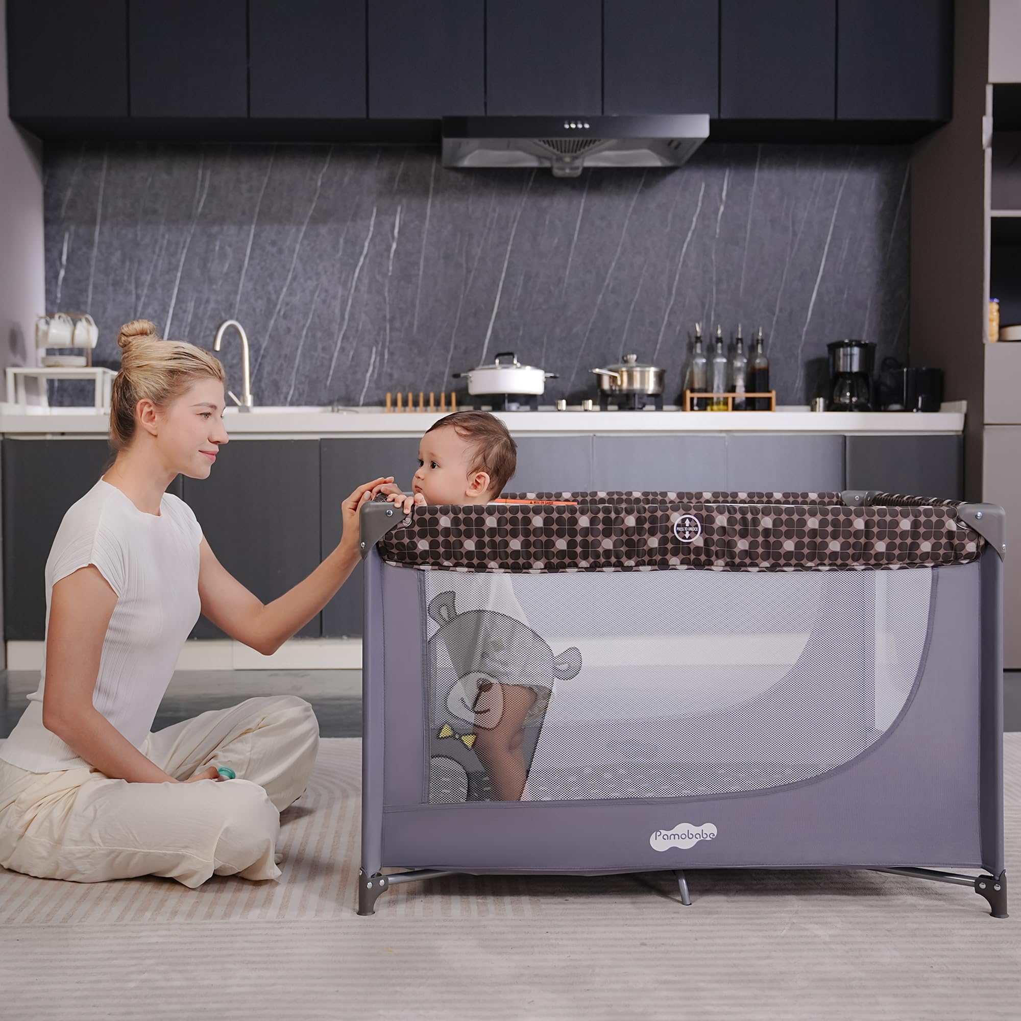Pamo Babe play yard mesh design for airflow and visibility.