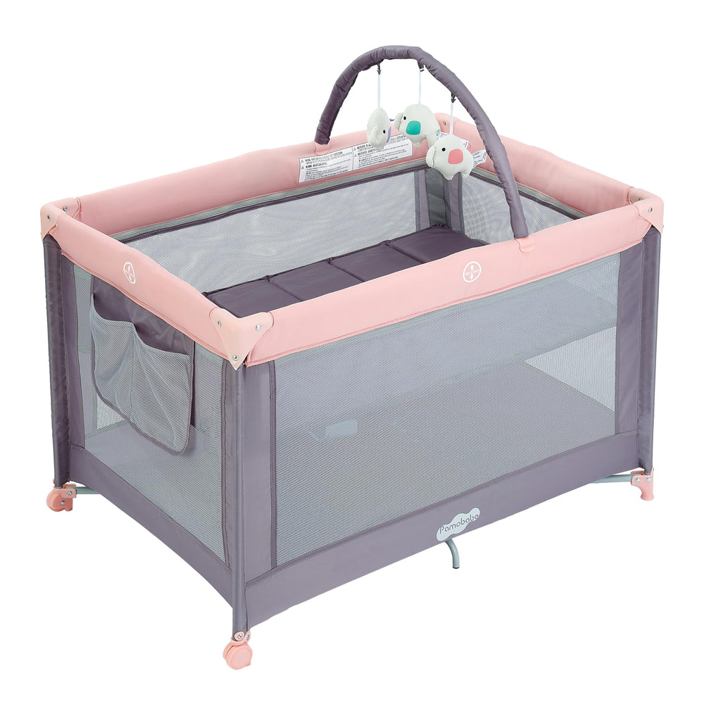 Pamo Babe Pack and Play bassinet folded for easy transport.