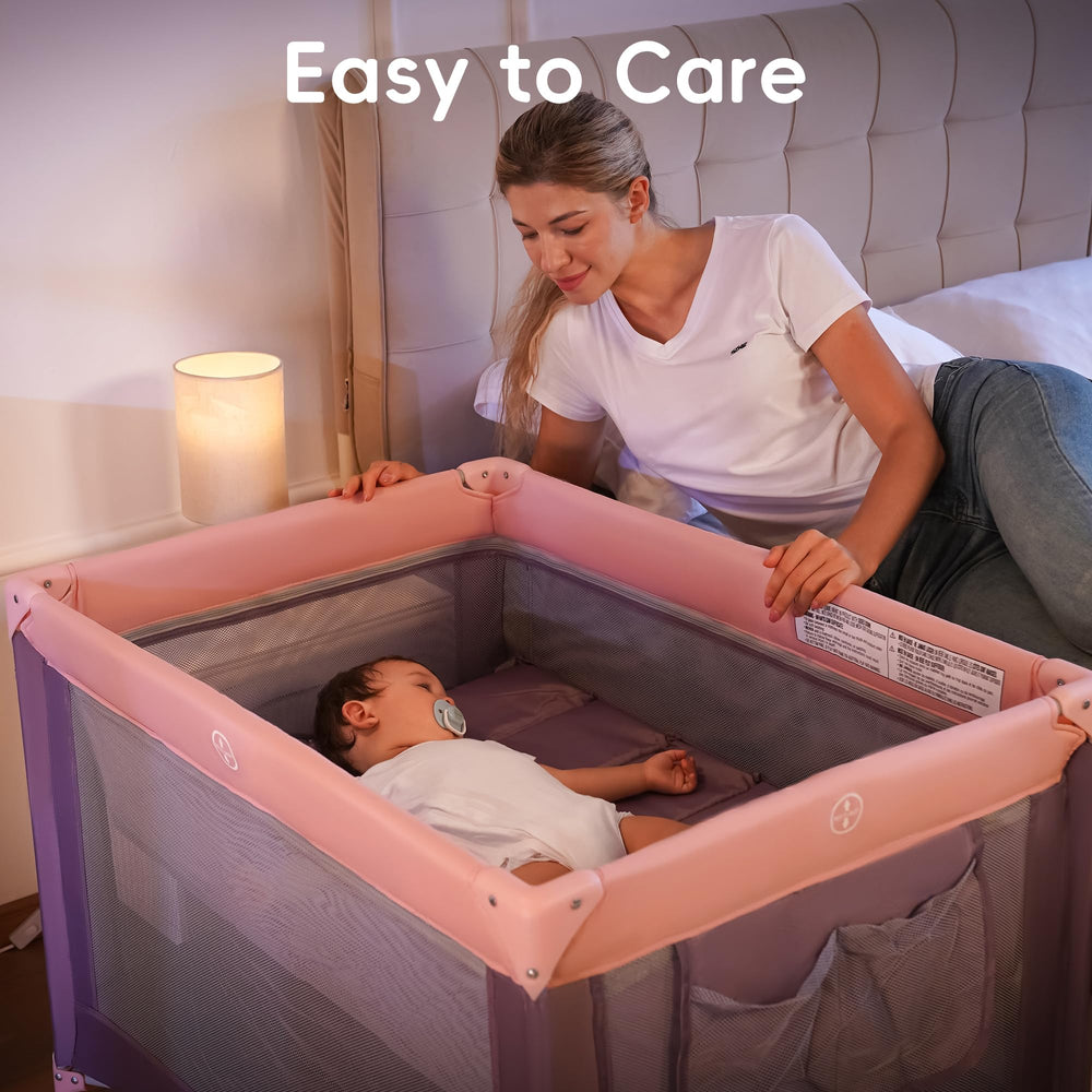 Pamo Babe Pack and Play easy-clean surface for quick wipes.