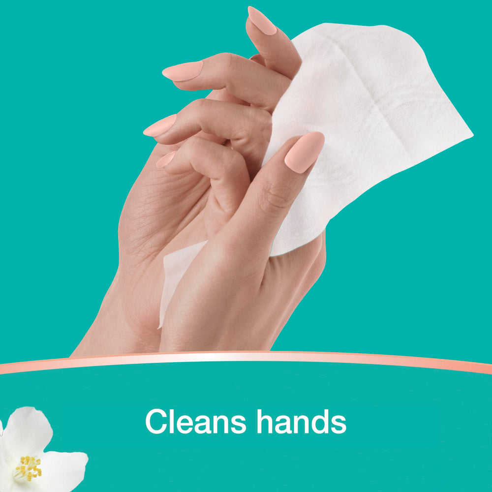 Pampers wipes shown cleaning hands and small surfaces