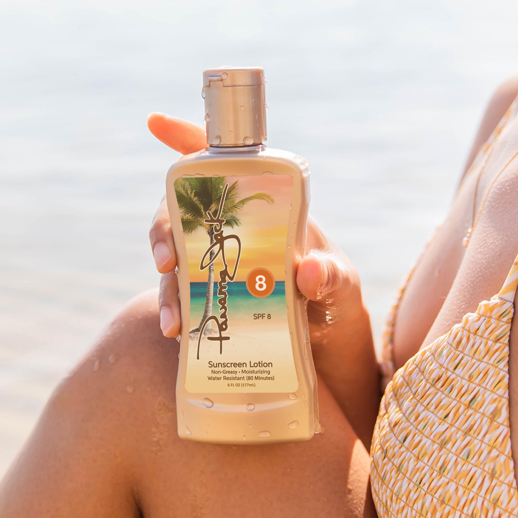 Panama Jack Sunscreen Tanning Lotion SPF 8 glide application demonstrates smooth spread for even tanning
