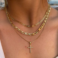 Pancert Cross Necklace paperclip chain paired with other layers.