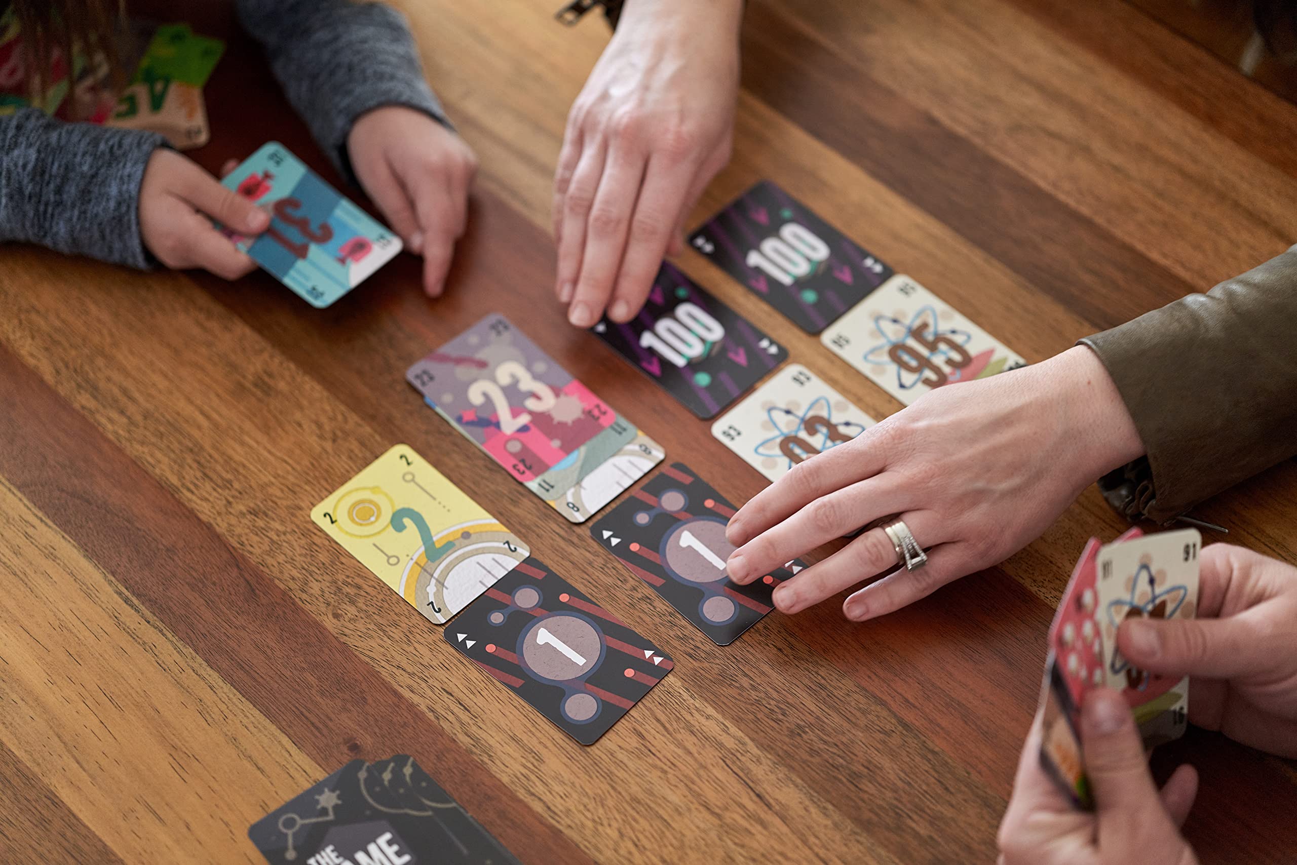 Pandasaurus The Game card distribution scene illustrating strategic planning