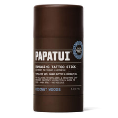 PAPATUI Coconut Woods tattoo stick bottle demonstrates mess-free hydration for tattoos.