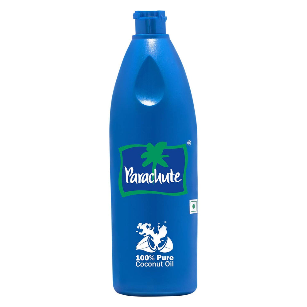 Parachute coconut oil fresh coconuts close-up; promotes natural skin hydration