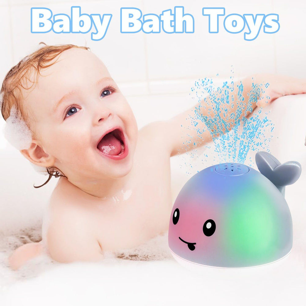 Parhilyar Toddla Whale LED bath toy lights up as water sprays.