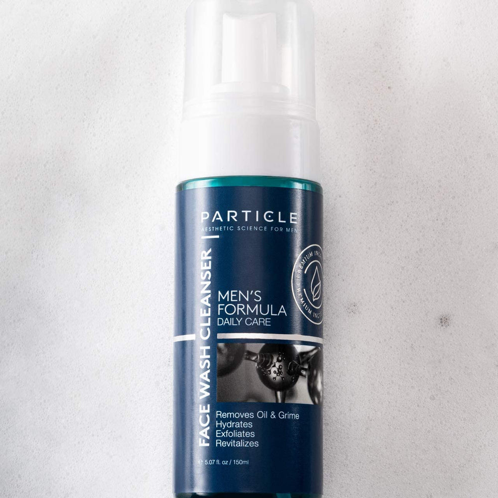 Packaging design of Particle Face Wash box beside bottle.
