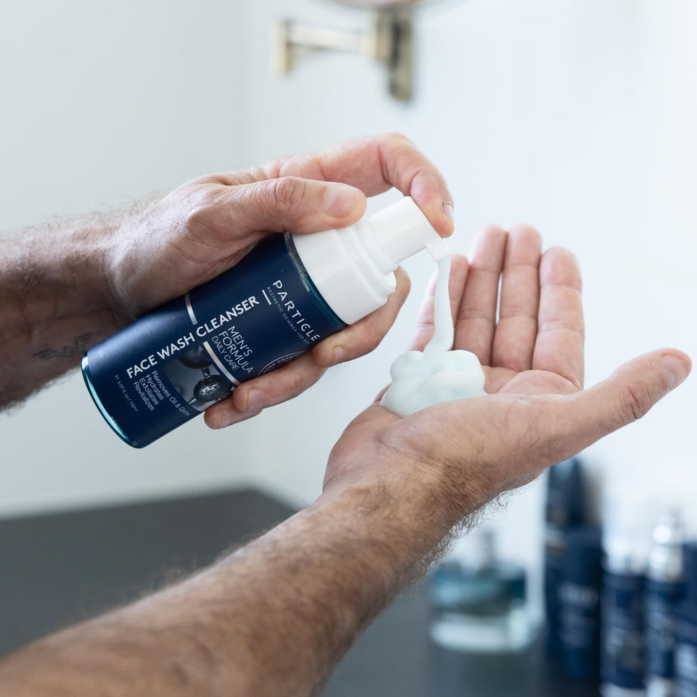 Particle Face Wash used in a shower for quick cleansing.