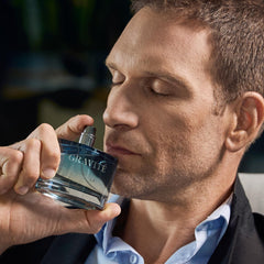 Particle Gravité label close-up highlights premium masculine branding.