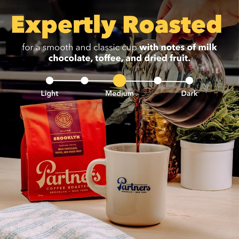 PARTNERS COFFEE ROASTERS Brooklyn Blend roast-date label signals freshness for brewing.