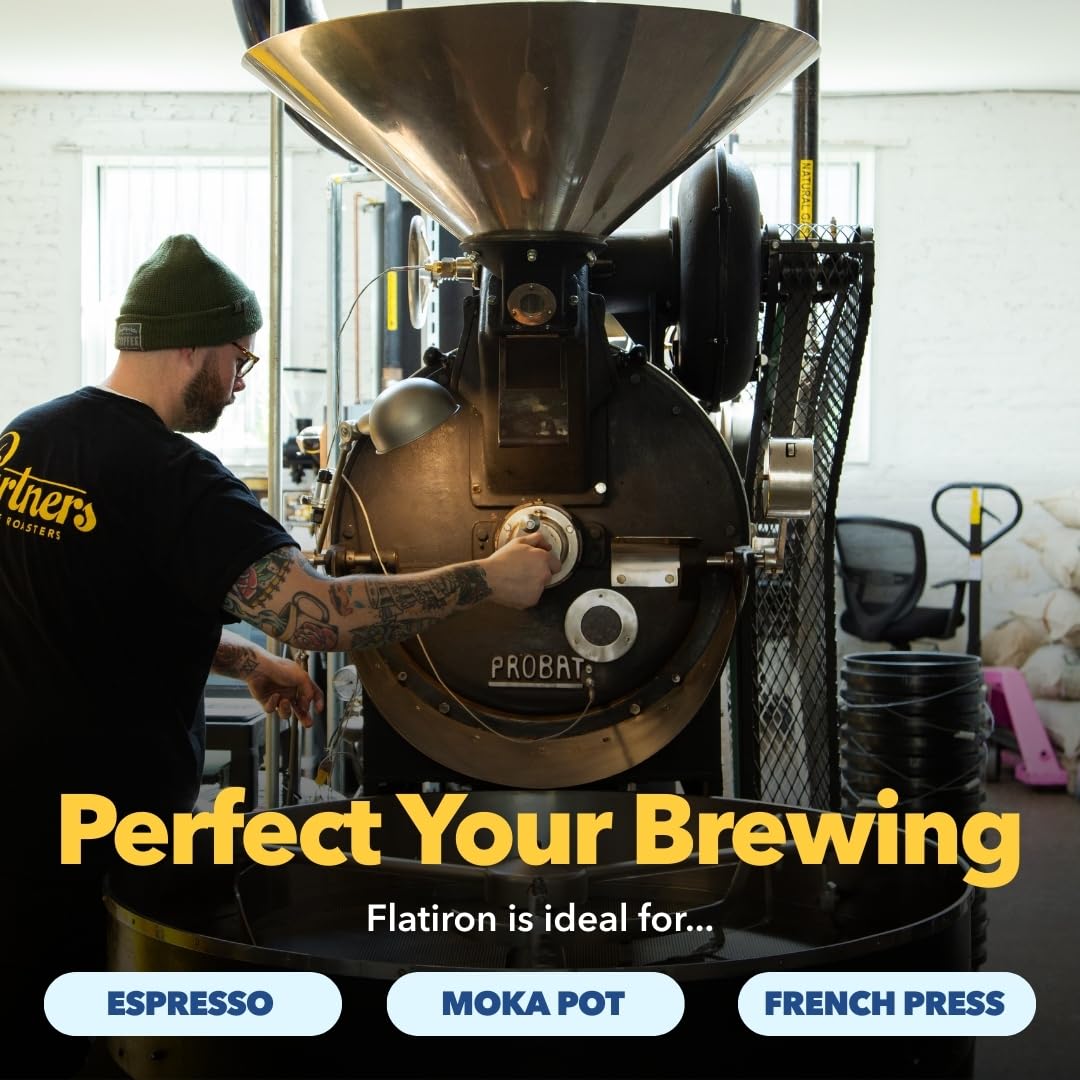 PARTNERS COFFEE ROASTERS Flatiron Blend cappuccino-glass showcases creamy milk balance and praline sweetness.