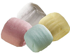 Pastel buttermints on party decor by Party Sweets add colorful centerpiece appeal.