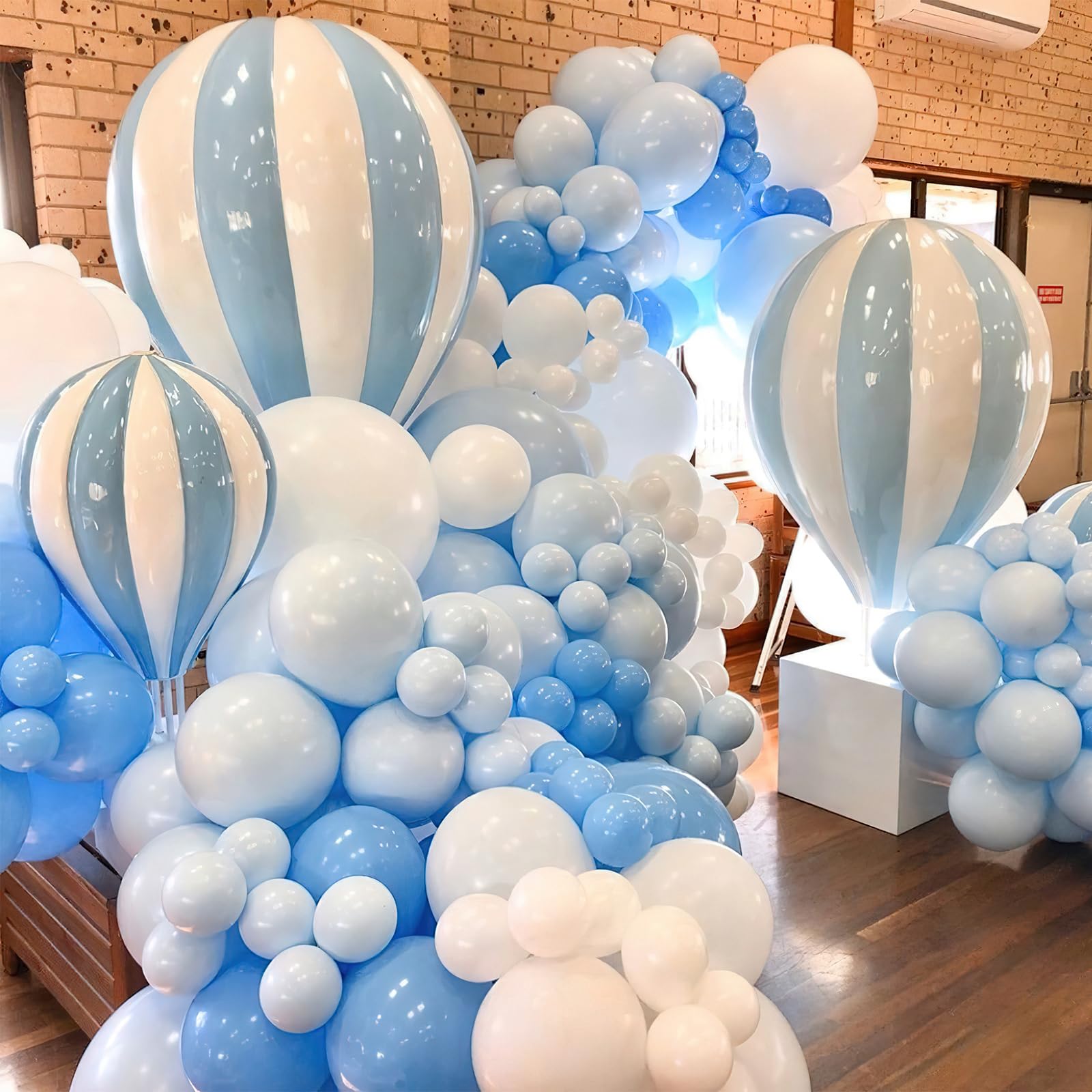 PartyWoo light blue balloons used as a centerpiece cluster for tables.