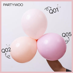 PartyWoo pale pink 12-inch balloons garland display in soft light