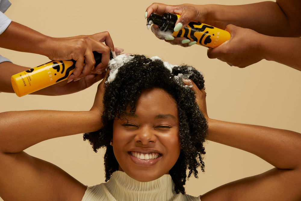 PATTERN Beauty Curl Mousse castor oil formula offering smoothing shine.