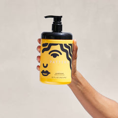 PATTERN bottle with pump demonstrates easy dispensing for moisture-rich routine.