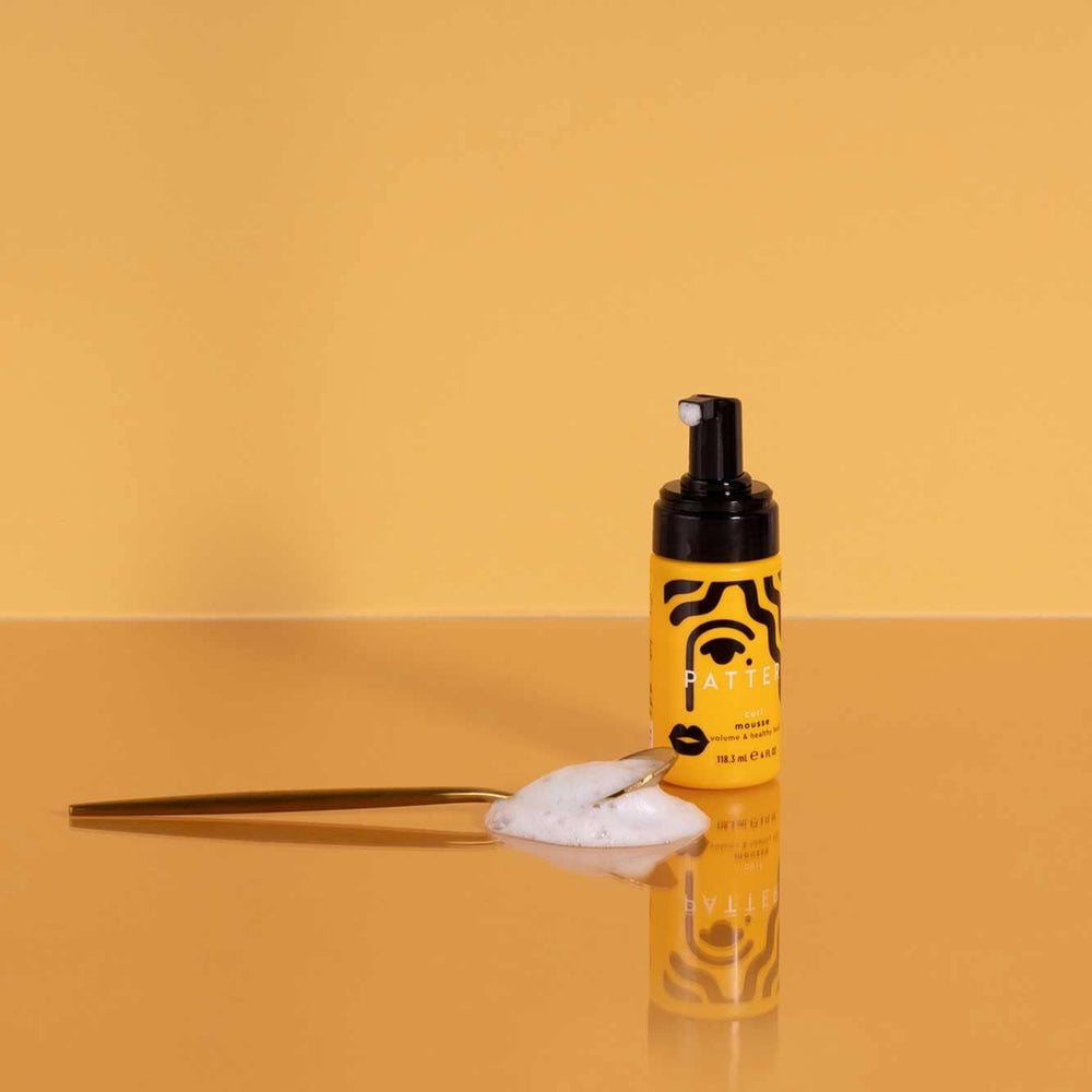 PATTERN Curl Mousse foam texture defines curls with soft definition and no crunch.