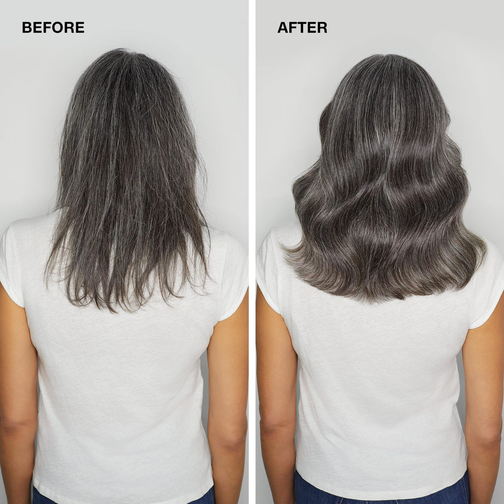 Paul Mitchell Extra-Body Sculpting Foam close-up highlighting citrus-neroli scent.
