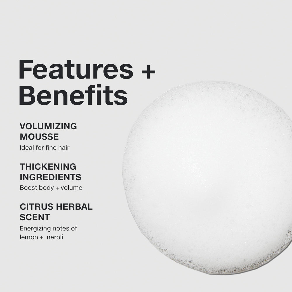 Paul Mitchell Extra-Body Sculpting Foam on damp hair ready for styling.