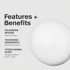 Paul Mitchell Extra-Body Sculpting Foam on damp hair ready for styling.