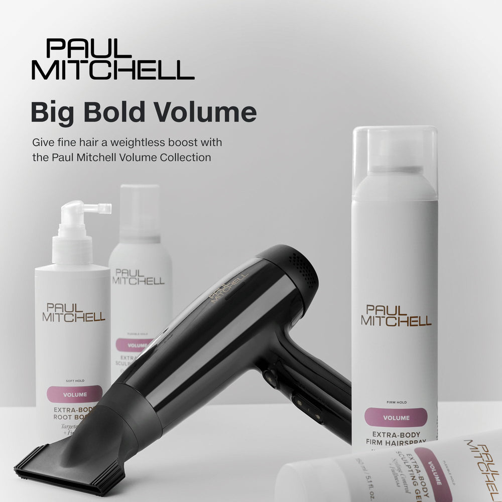 Paul Mitchell Extra-Body Foam applied to clean hair for fuller blowouts.