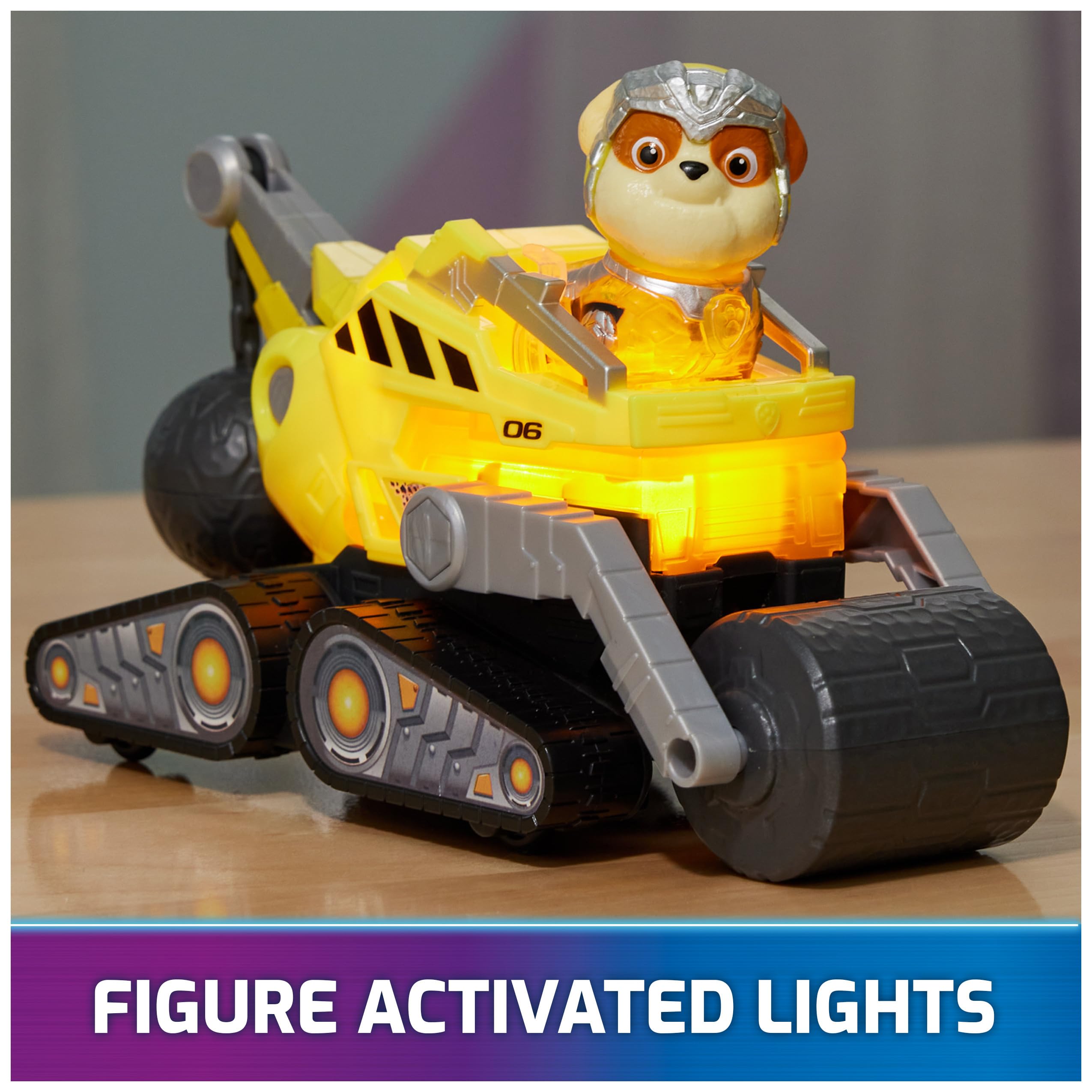 Paw Patrol Rubble action figure with translucent parts for light-up play.