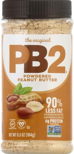 PB2 jar with spoon ready to mix into smoothies.