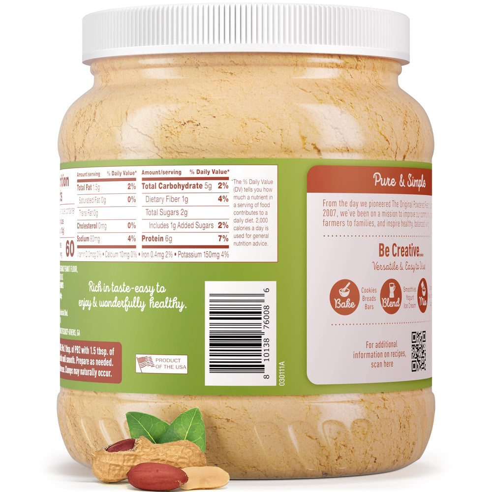 Opened PB2 jar with measuring scoop ready for mixing.