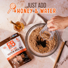 PBfit protein balls being rolled from the dough
