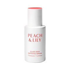 Peach & Lily Glass Skin Serum bottle on clean surface, suggesting radiant hydration