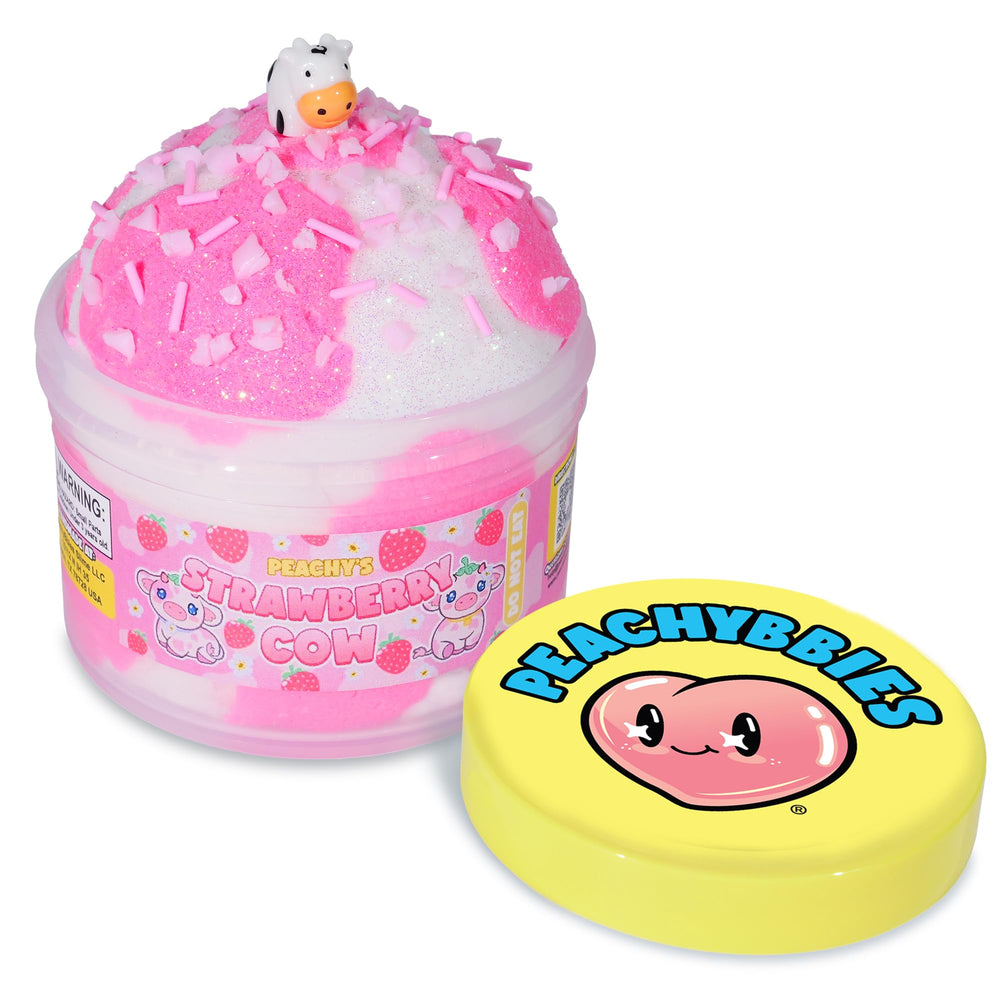 PEACHYBBIES Strawberry Cow Cloud Slime jar with cow charm for sensory play.