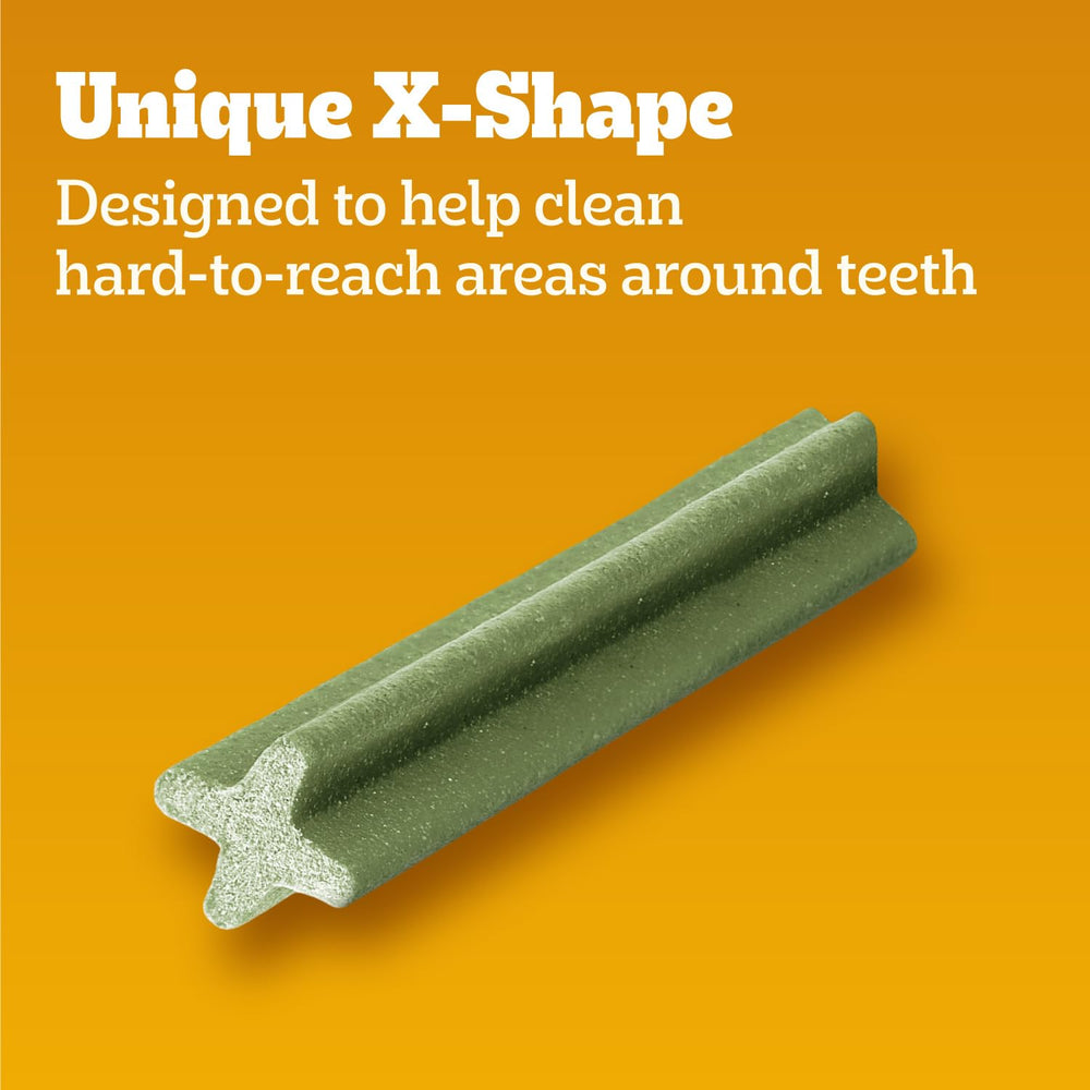 Pedigree Dentastix dog chewing action demonstrates engaging chew.