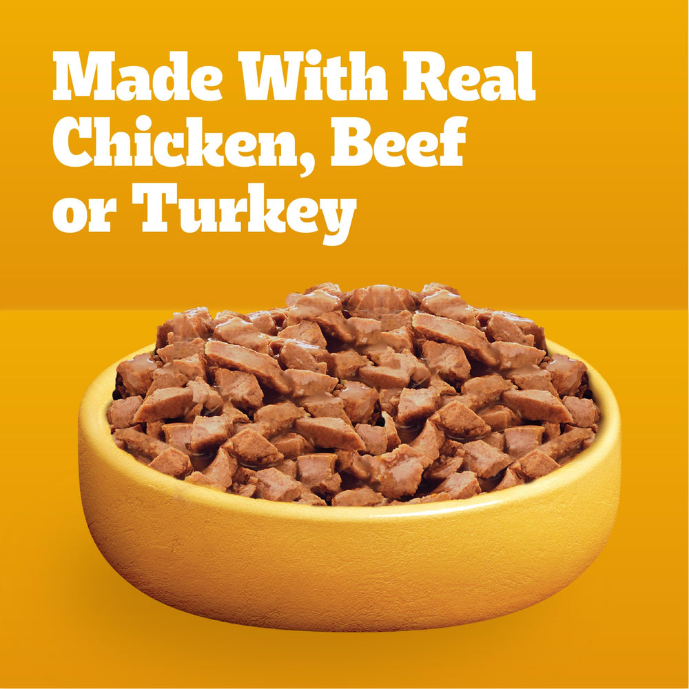 Pedigree Puppy Morsels in Sauce topping dry kibble for extra moisture and flavor.