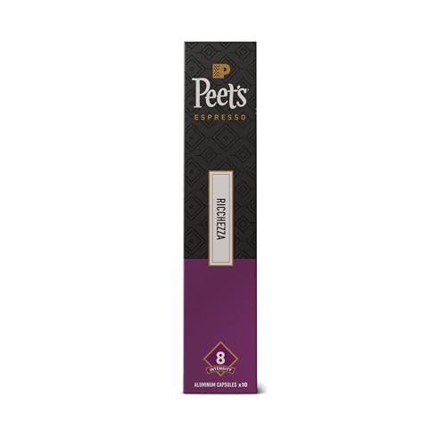 Label close-up highlights 100% Arabica blend and intensity 8 for balanced flavor