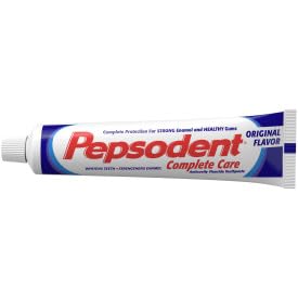 Pepsodent Complete Care mint tube close-up for refreshing daily breath.