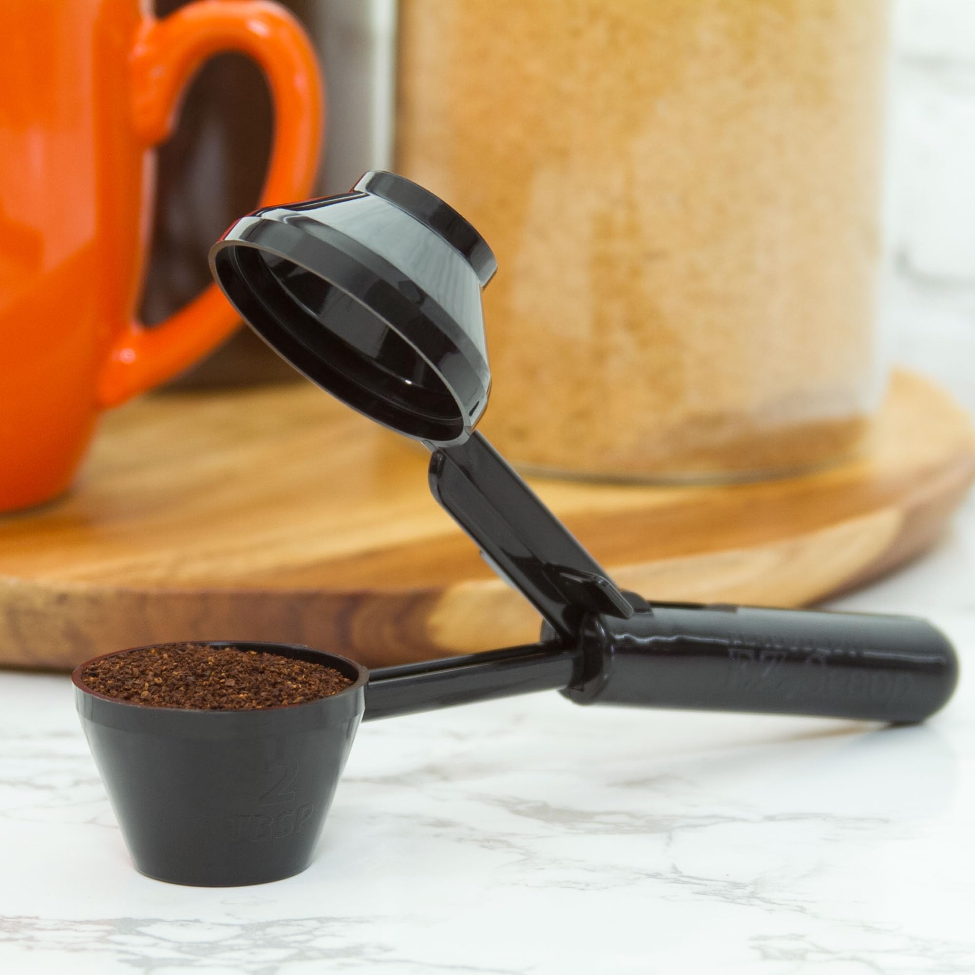 Perfect Pod EZ-Scoop two-tablespoon capacity ensures consistent coffee portions.