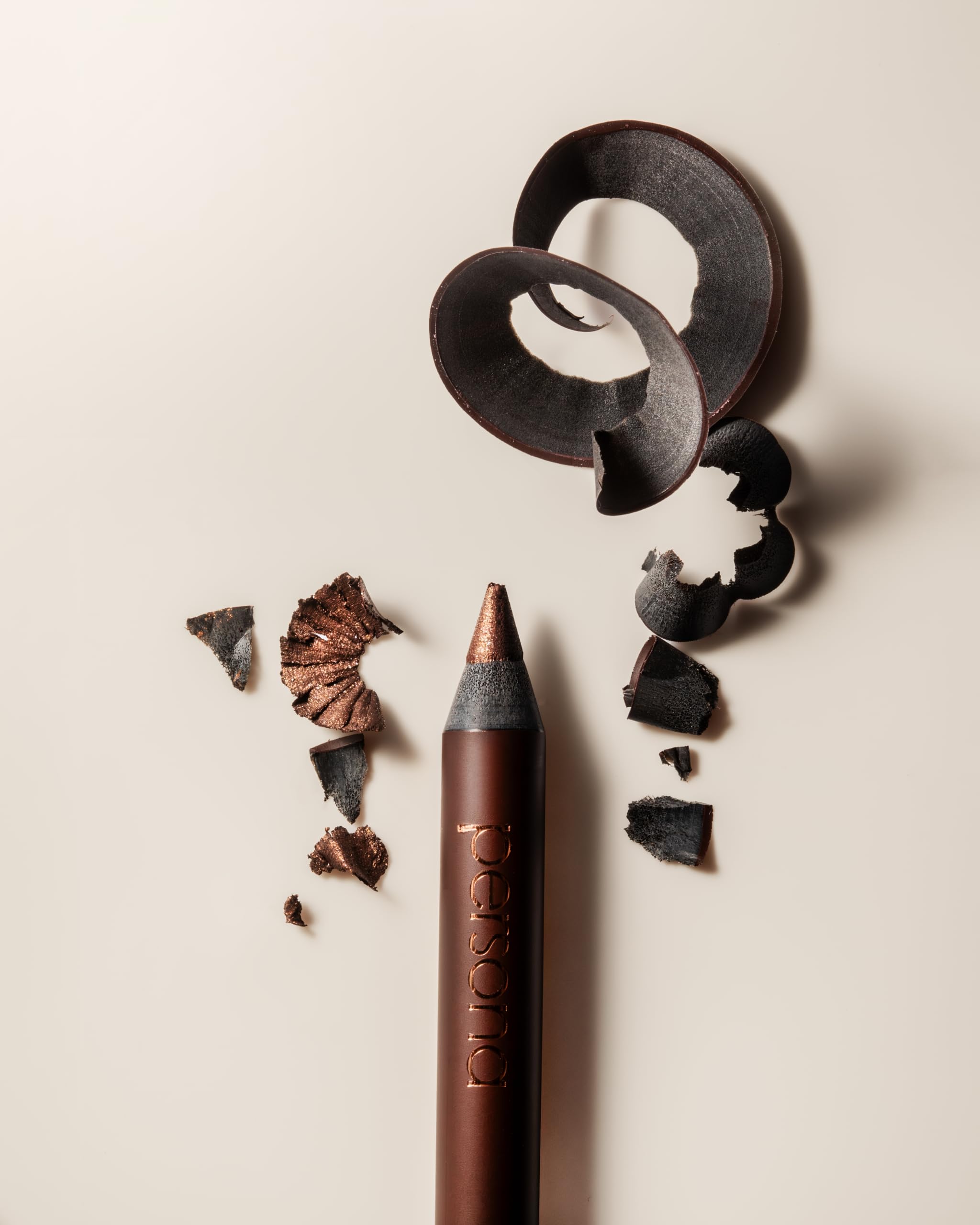 Waterline definition using plum shade for subtle intensity on the lash line.