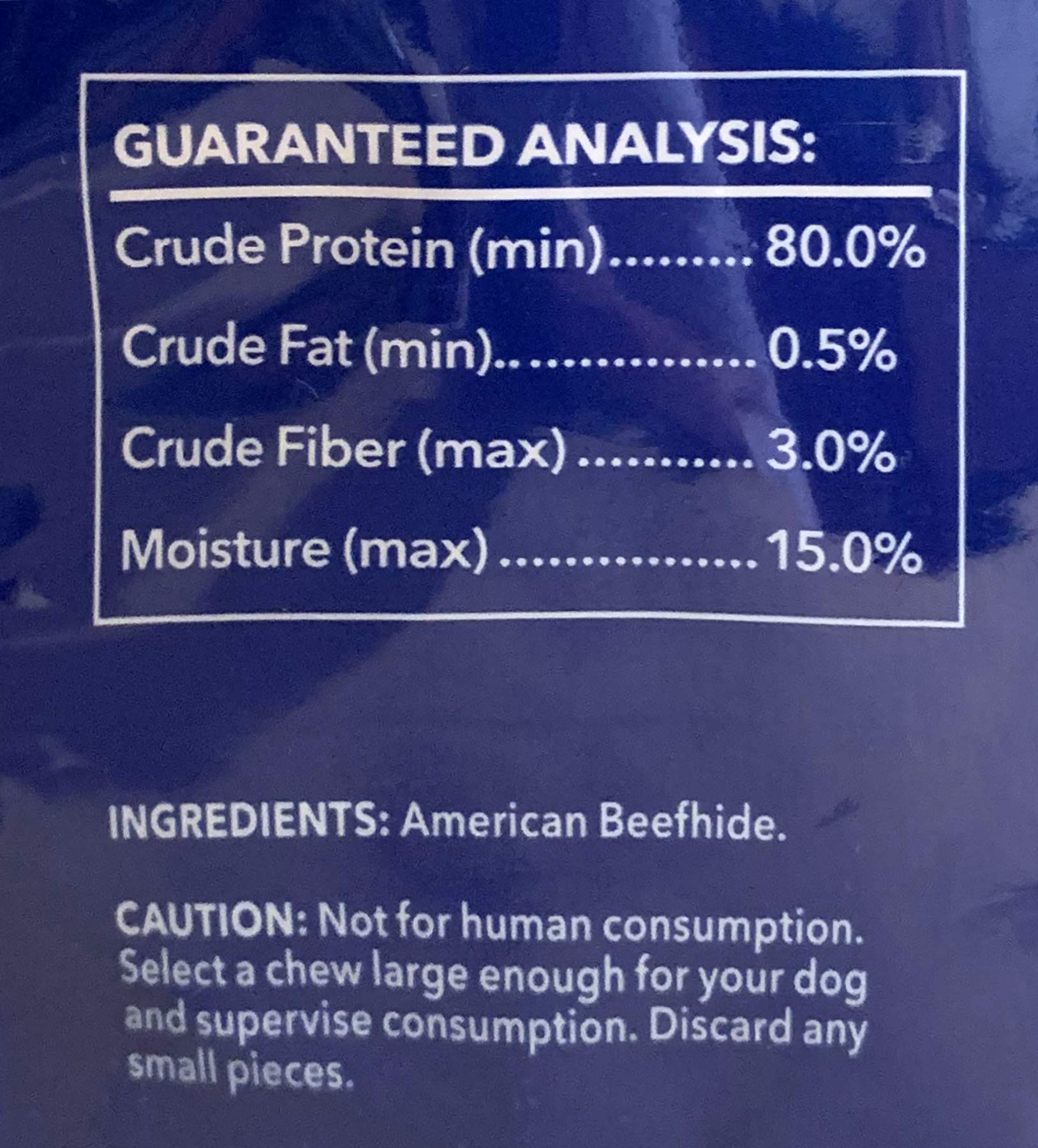 Pet Factory packaging label close-up communicates safety standards and quality control.