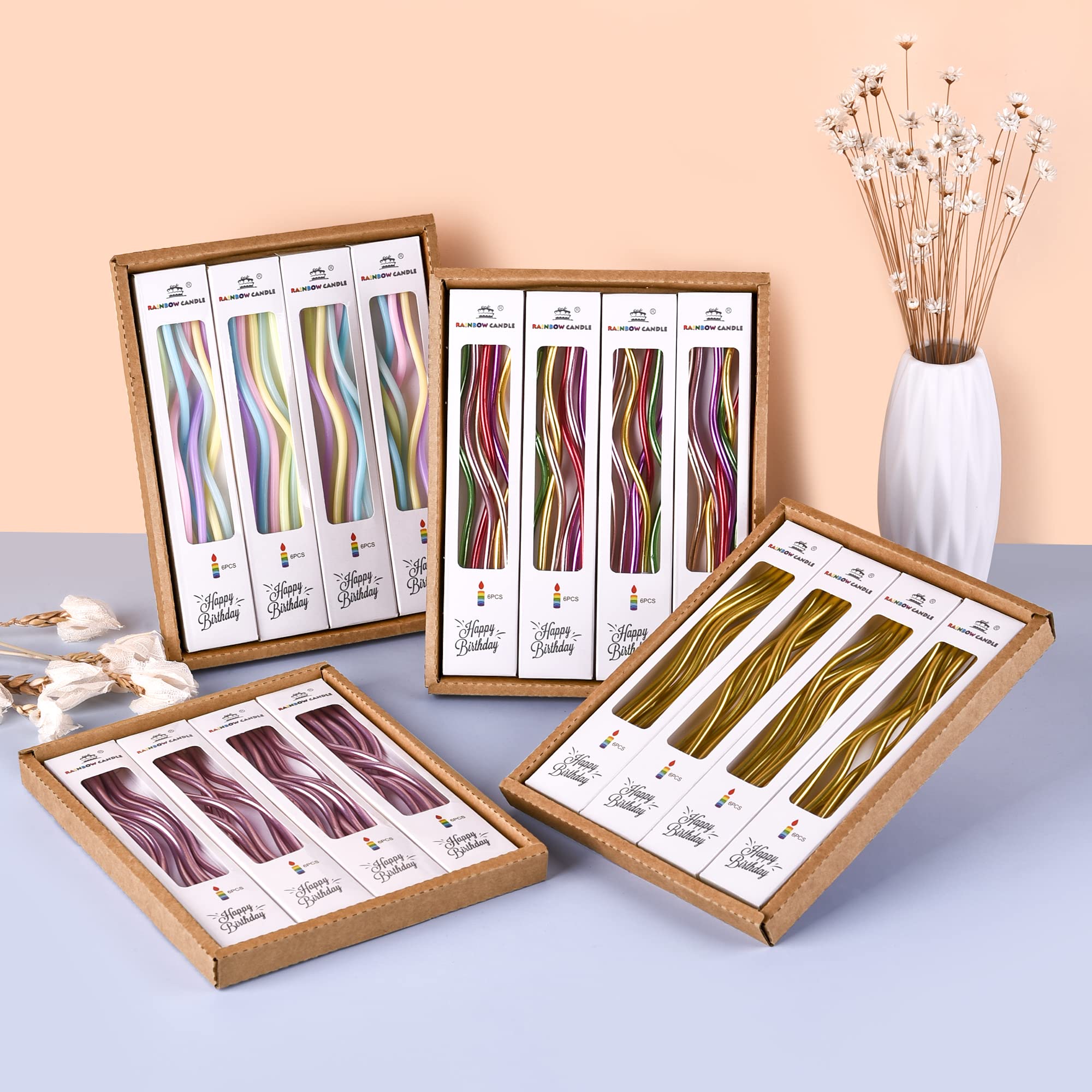 PHD CAKE bakery shop display candles with bright gold accents.