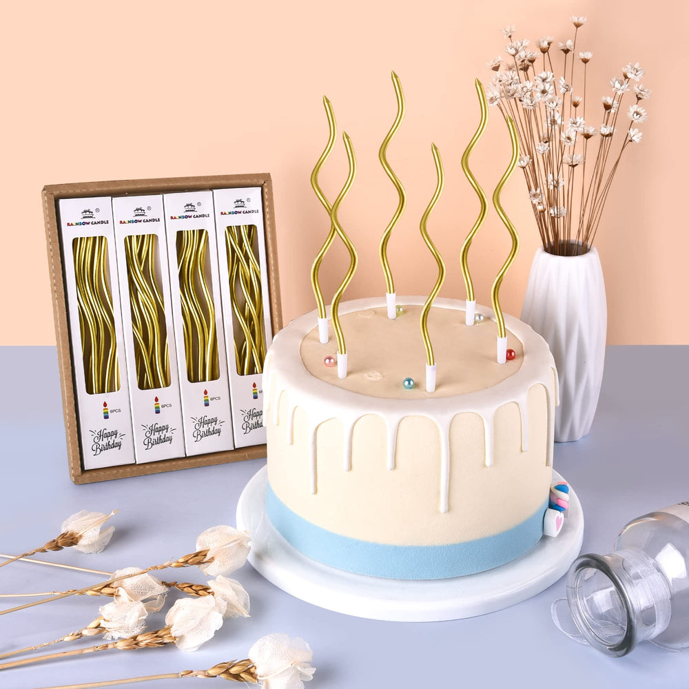 PhD CAKE gold spiral candle on cake with holder to keep frosting clean.